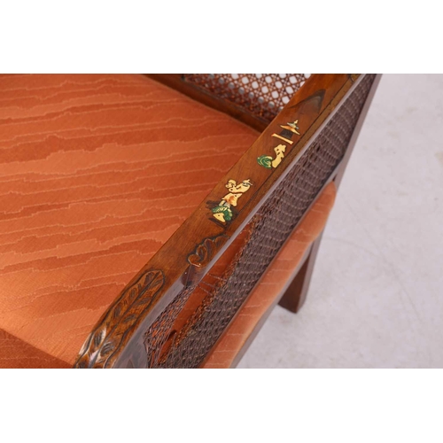 136 - An early 20th-century walnut and chinoiserie lacquer three-piece bergere lounge suite, probably 1920... 