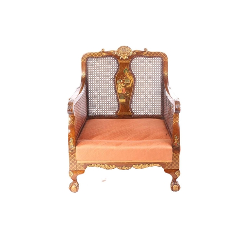 136 - An early 20th-century walnut and chinoiserie lacquer three-piece bergere lounge suite, probably 1920... 