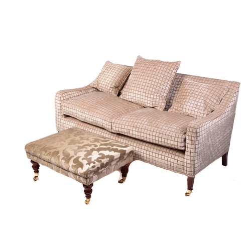 142 - A Regency style settee, 20th century, well upholstered in a square grid pattern material, on square ... 