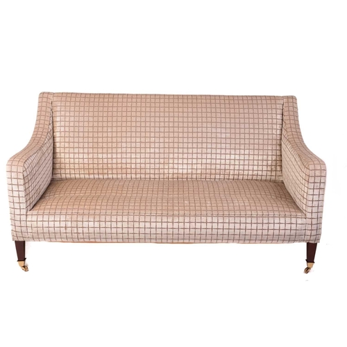 142 - A Regency style settee, 20th century, well upholstered in a square grid pattern material, on square ... 