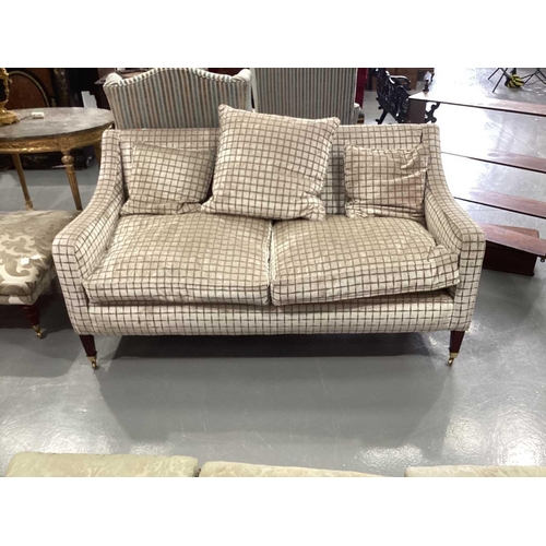 142 - A Regency style settee, 20th century, well upholstered in a square grid pattern material, on square ... 