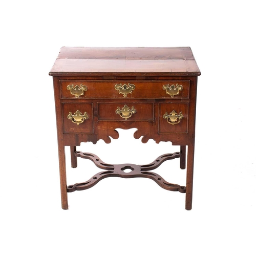 143 - A George III mahogany kneehole lowboy with cross and feather banded top above a single frieze drawer... 