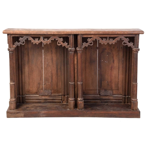 146 - A carved oak choir front, parts possibly 18th century French, the later top over panelled backs and ... 