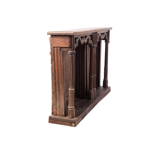 146 - A carved oak choir front, parts possibly 18th century French, the later top over panelled backs and ... 