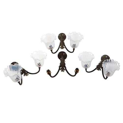 147 - Four sets of late 19th-century French-style brass wall sconces, twin branch with leaf decoration, th... 