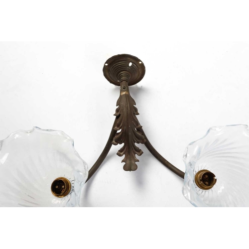 147 - Four sets of late 19th-century French-style brass wall sconces, twin branch with leaf decoration, th... 