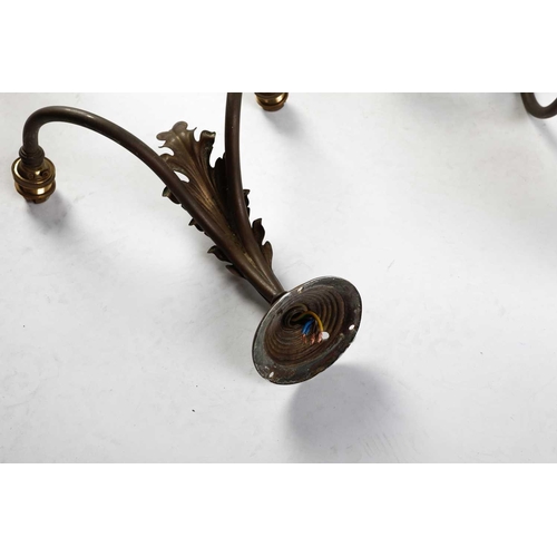 147 - Four sets of late 19th-century French-style brass wall sconces, twin branch with leaf decoration, th... 