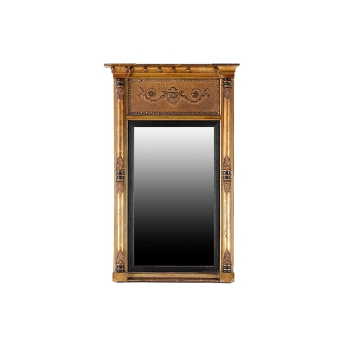 150 - A Regency carved wood and gilt gesso pier glass, the inverted breakfront frame with sphere set corni... 