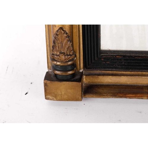 150 - A Regency carved wood and gilt gesso pier glass, the inverted breakfront frame with sphere set corni... 