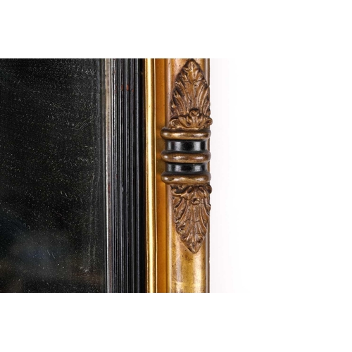 150 - A Regency carved wood and gilt gesso pier glass, the inverted breakfront frame with sphere set corni... 
