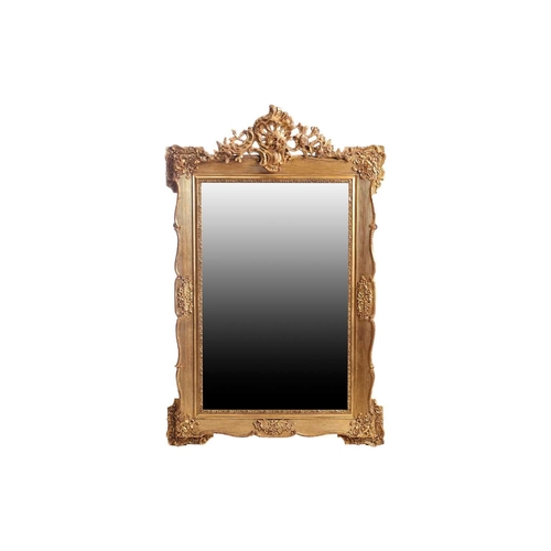 151 - A 19th-century moulded and gilt plaster mirror with bevelled glass, the crest with a bird amongst ro... 