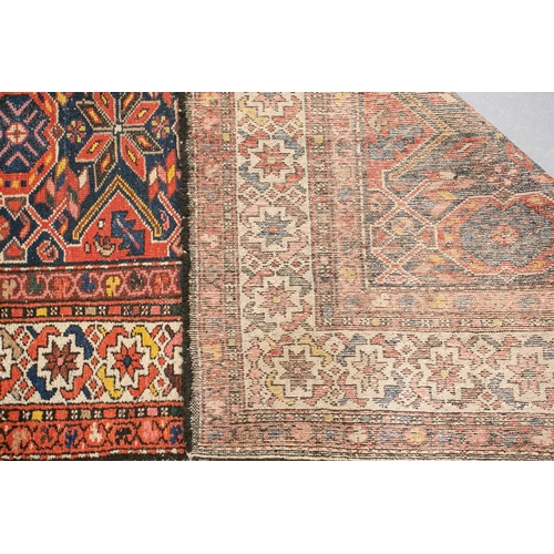 152 - An antique Hammadan runner with a central star lozenge pole on a blue ground within multiple borders... 