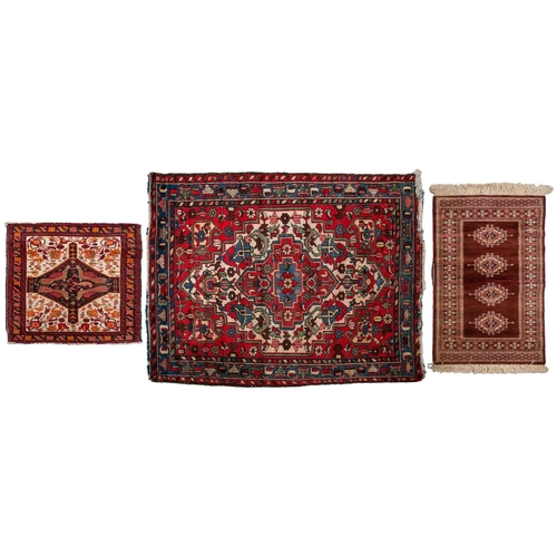 154 - An Afshar bag face with chickens and figures on an ivory ground, 70 cm x 67 cm, and a Turkoman mat a... 