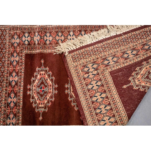 154 - An Afshar bag face with chickens and figures on an ivory ground, 70 cm x 67 cm, and a Turkoman mat a... 