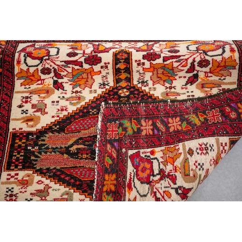 154 - An Afshar bag face with chickens and figures on an ivory ground, 70 cm x 67 cm, and a Turkoman mat a... 