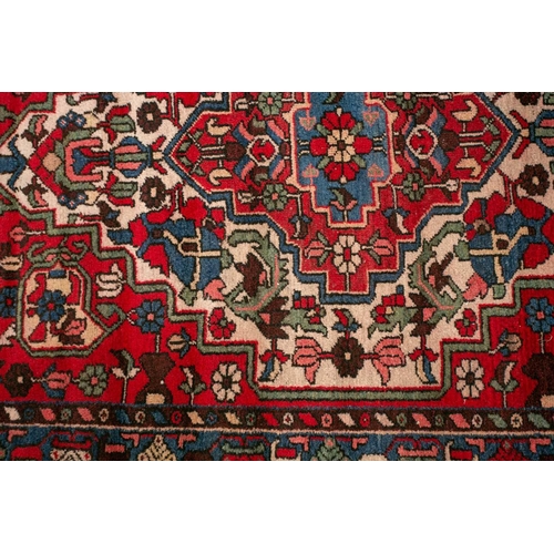 154 - An Afshar bag face with chickens and figures on an ivory ground, 70 cm x 67 cm, and a Turkoman mat a... 