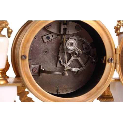 165 - A Louis XVI-style white marble and ormolu 8-day clock garniture, early 20th century, fitted with a s... 