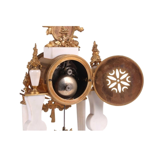 165 - A Louis XVI-style white marble and ormolu 8-day clock garniture, early 20th century, fitted with a s... 
