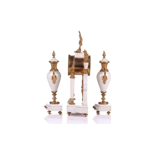 165 - A Louis XVI-style white marble and ormolu 8-day clock garniture, early 20th century, fitted with a s... 