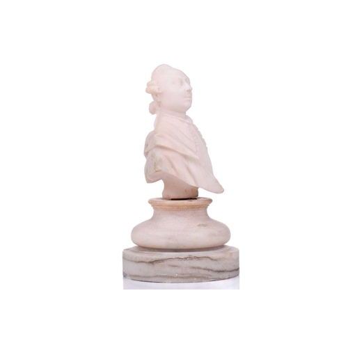 172 - An alabaster bust of George III, on an associated circular base, 19 cm high. Loose on base, with som... 