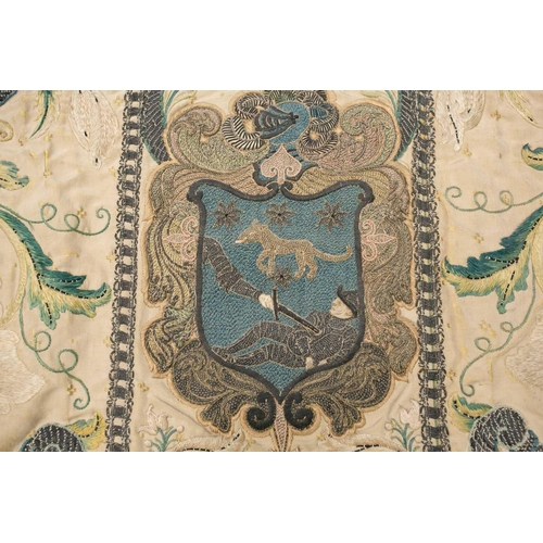 177 - An 18th-century silk and metal thread embroidered Chasuble panel, worked with a coat of arms, 121 cm... 