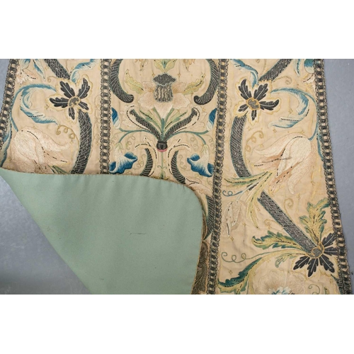 177 - An 18th-century silk and metal thread embroidered Chasuble panel, worked with a coat of arms, 121 cm... 