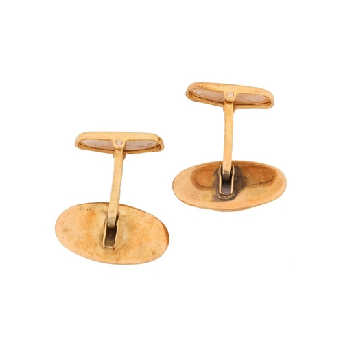 12 - A pair of emerald cufflinks, each set with an oval cabochon emerald, with Italian control marks mark... 