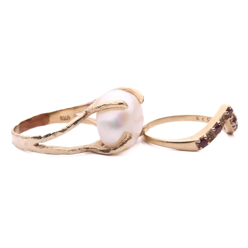 123 - A pearl ring and a gem-set wishbone ring; the pearl ring features a button-shaped cultured pearl of ... 