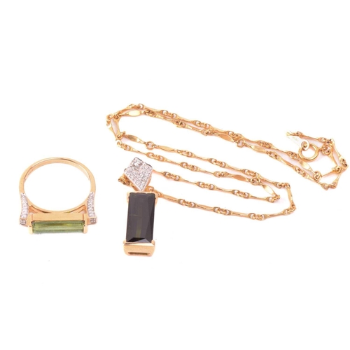 124 - A tourmaline and diamond ring and similar pendant on chain; the ring features an elongated baguette-... 