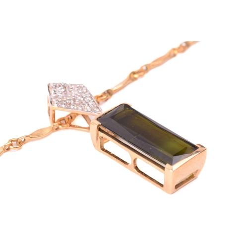 124 - A tourmaline and diamond ring and similar pendant on chain; the ring features an elongated baguette-... 