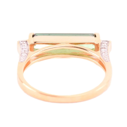 124 - A tourmaline and diamond ring and similar pendant on chain; the ring features an elongated baguette-... 