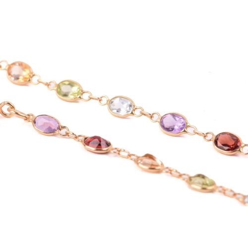 125 - A gem-set harlequin necklace, open-back links set with oval-cut gemstones of 4.0 mm, alternating wit... 