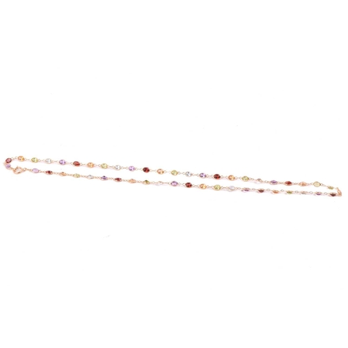 125 - A gem-set harlequin necklace, open-back links set with oval-cut gemstones of 4.0 mm, alternating wit... 