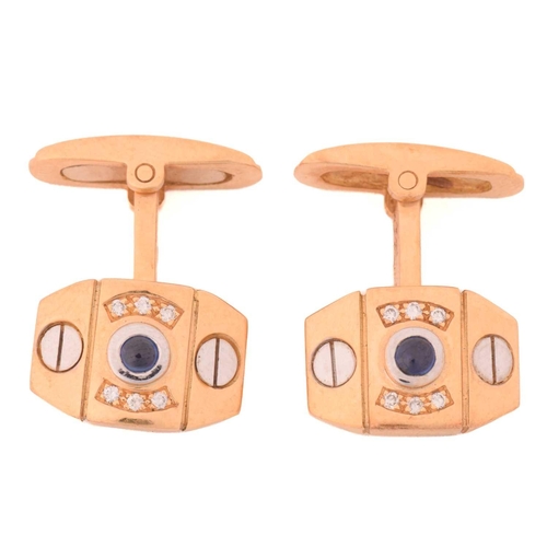 129 - A pair of sapphire and diamond cufflinks, each consisting of an octagonal plaque, centred with a sap... 