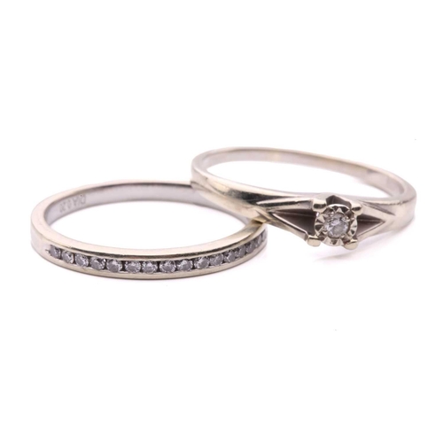 13 - A diamond solitaire ring, set with a round brilliant cut diamond with an estimated weight of 0.05ct,... 