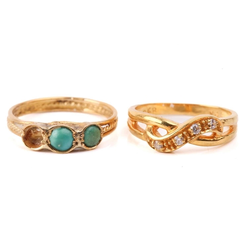 131 - Six yellow metal rings; to include a diamond-set crossover ring, size M; a three-stone turquoise hal... 