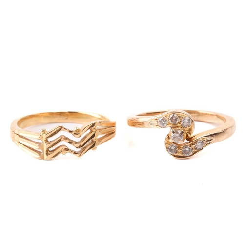 131 - Six yellow metal rings; to include a diamond-set crossover ring, size M; a three-stone turquoise hal... 