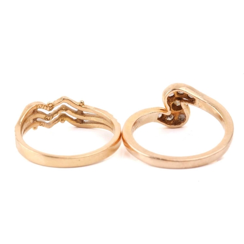 131 - Six yellow metal rings; to include a diamond-set crossover ring, size M; a three-stone turquoise hal... 