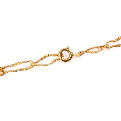 133 - A textured peanut link chain, organically textured, connected by a gilt spring-ring clasp, yellow me... 