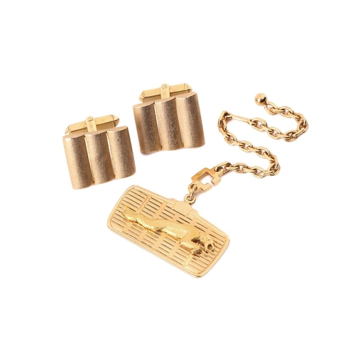 142 - An 18ct gold Jaguar key fob, in the form of a radiator grill with an applied jaguar, hallmarked for ... 
