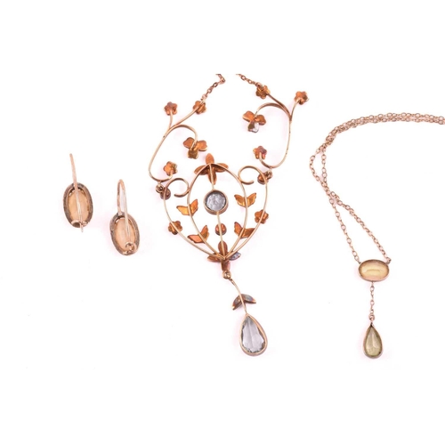 145 - An Edwardian styled aquamarine and seed pearl necklace and three others; the scrolling foliate centr... 