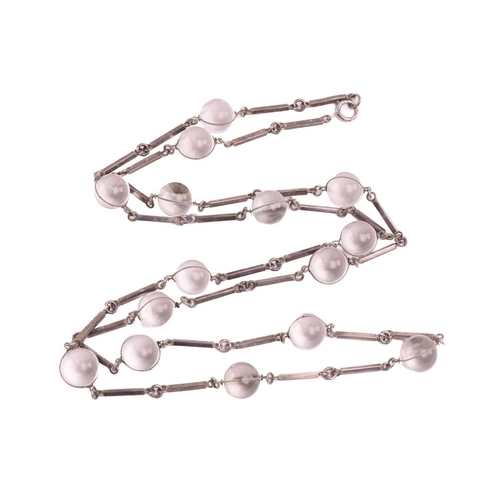 146 - A rock crystal 'Pools of light' necklace, composed of fifteen crystal orbs of 12.7 mm, wrapped aroun... 