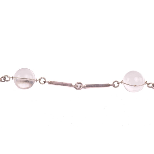 146 - A rock crystal 'Pools of light' necklace, composed of fifteen crystal orbs of 12.7 mm, wrapped aroun... 
