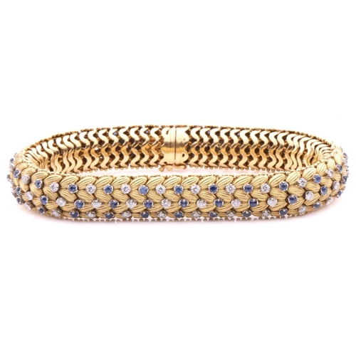 150 - Illario - a diamond and sapphire snake link bracelet, circa 1960, the articulated links of foliate d... 