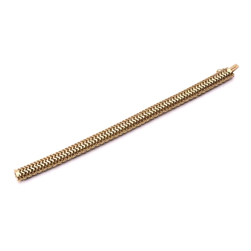 150 - Illario - a diamond and sapphire snake link bracelet, circa 1960, the articulated links of foliate d... 