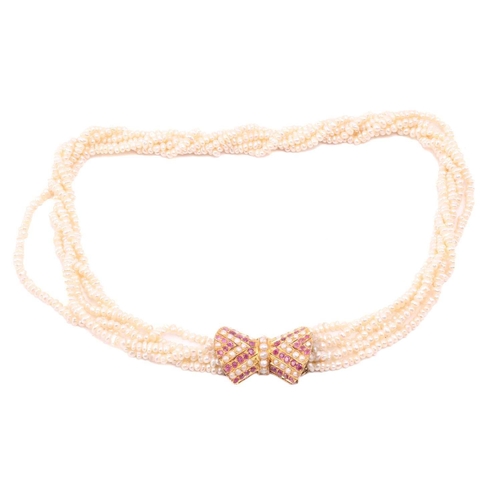 153 - A keshi pearl sautoir necklace with gem-set clasp, comprising five rows of keshi pearls, completed w... 