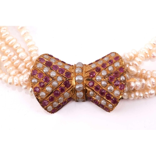 153 - A keshi pearl sautoir necklace with gem-set clasp, comprising five rows of keshi pearls, completed w... 