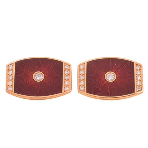 160 - A pair of Fabergé diamond and enamel cufflinks, in red guilloche enamel, set to the centre with a ro... 