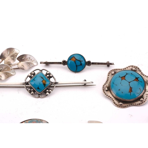 163 - A collection of Arts & Crafts jewellery; to include a shagreen-set silver pendant, of foliage design... 