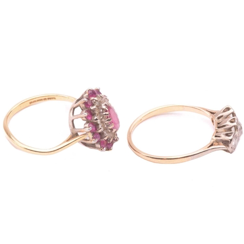 164 - A three stone diamond ring together with a ruby and diamond cluster ring; the first set with a trio ... 